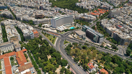 Aerial drone photo of Athens Metropolitan dense populated area in Vasilisis Sofias and Vasileos Konstantinou avenues, Attica, Greece
