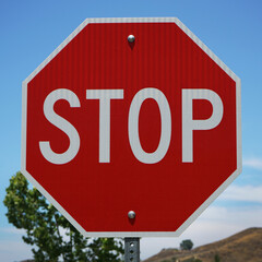 Obraz premium Close up of octogonal red stop sign.