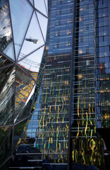 Reflections of buildings in the window of other buildings on Skyscrapers in Seattle Washington
