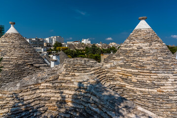 A view of Alberobello, Italy through the roof tops of traditional Trulli buildings