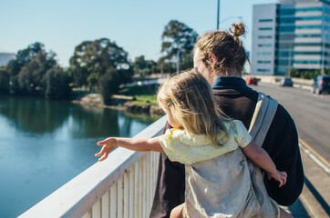 Father and daughter in city