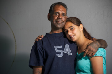 Aboriginal Australian Man and Woman Hugging