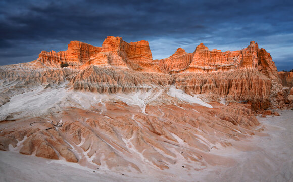 Storm clouds build over Red top desert landforms
