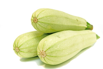 Fresh green zucchini isolated on a white background