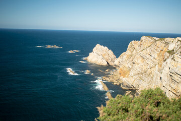 views on the cliff above the lighthouse of luanco