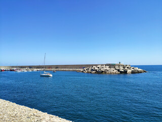 walk along the promenade of luanco