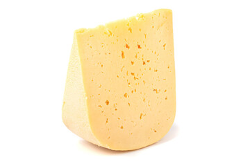 a piece of hard cheese on a white isolated background close-up