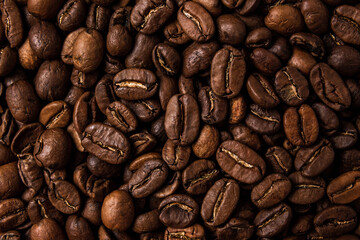 Roasted coffee beans on the table, macro