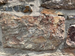 schöne alte Steinmauer mit einer schönen Musterung