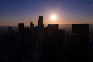 Los Angeles downtown silhouette against the sunset background in California