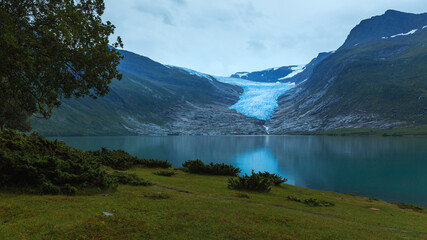 Svartisen Glacier landscape with ice, mountains and sky in Norway