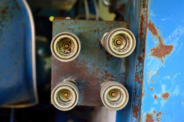 four hydraulic oil connection plugs on heavy duty machinery