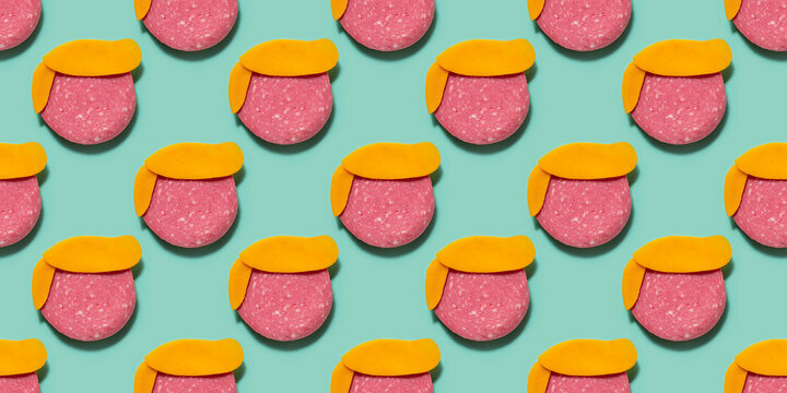 Pattern illustration representing a face made with cheese and salami