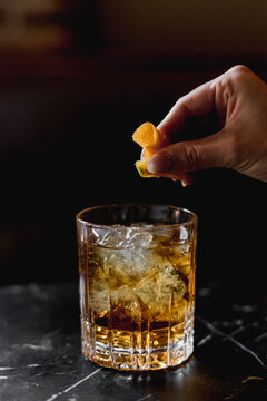 Drink In Glass On Black Marble Surface