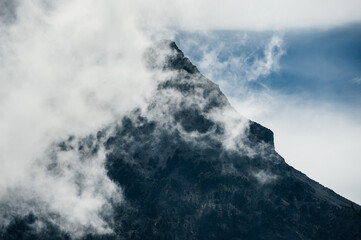 mountain peak covered by clouds in mexico