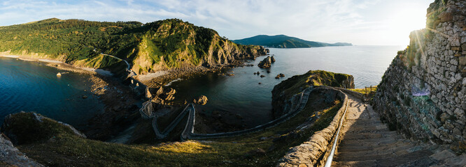 Hermitage of San Juan de Gaztelugatxe at the top of the island of Gaztelugatxe. Vizcaya, Basque Country (Spain). View of the stairs to ascend
