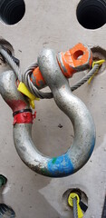 the shackle is attached to two slings