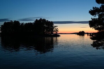 Sunset over lake with island