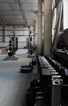 Rack with dumbbells in gym