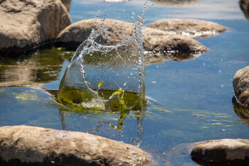 Stones. A spray of water. Spray on water from stone. Selective focus.