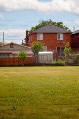 Fototapeta na wymiar Houses in front of the field