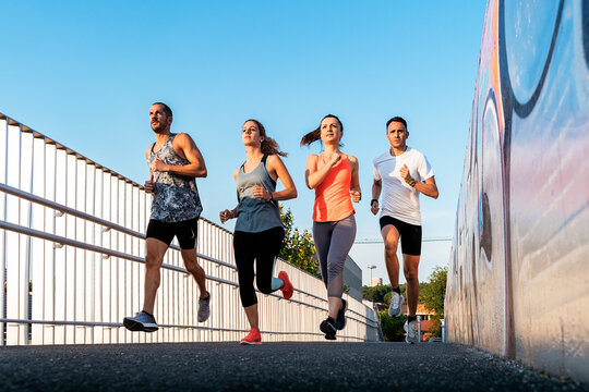 Athletes running in the street