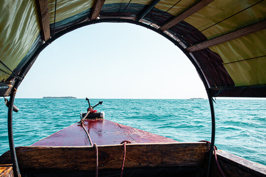 Front View Boat Floating On Ocean