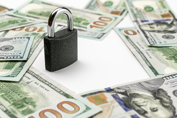 Money saved. American money. Washington American cash with padlock isolated on white, usd background