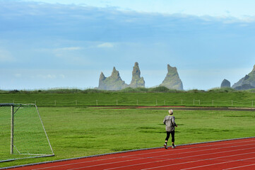 morning jogging at the stadium of Vik, Iceland
