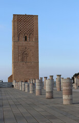 Hassan Tower near the Mausoleum of King Mohammed V. The minaret of an incomplete mosque. Historical and tourist complex in Rabat, Morocco.