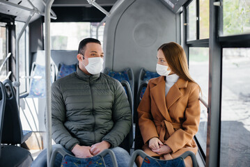 Passengers on public transport during the coronavirus pandemic keep their distance from each other. Protection and prevention covid 19