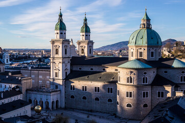 Fototapeta na wymiar View of Salzburg Rooftops and Salzburg Cathedral (Salzburger Dom) from Hohensalzburg Fortress