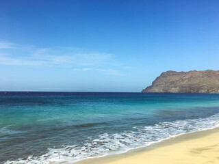 A perfect background of vacations theme in the summer - the blue sea and the sand