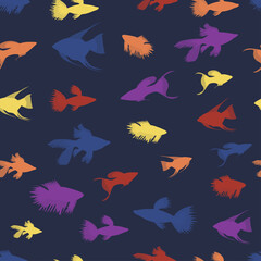 Seamless vector pattern with colored fishes on a blue background. Aquarium fishes.