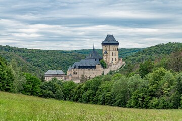 Beautiful view of Gothic castle Karlstejn. Medieval castle was built in gothic style by king and emperor of old Roman rise, Charles IV. It is situated in central Bohemia near Prague - Czech Republic