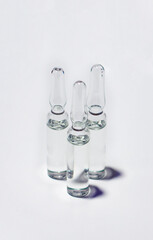 Medical ampoules on the white background