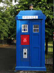 An old blue police booth in Glasgow, Scotland, UK.