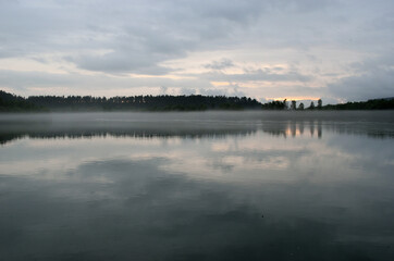 heavy mist over river landscape