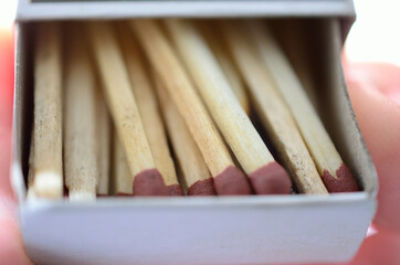 Matchbox with new and used matches/sticks