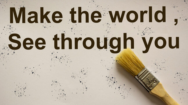 On a white leaf with a brush the text Make the world see through you