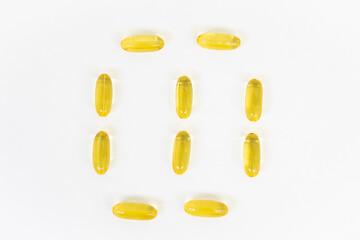 Yellow capsules of vitamin omega 3. Dietary Supplement. Fish oil in capsules.