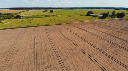 Naklejka premium Plowed fields of Russia. Aerial drone view.