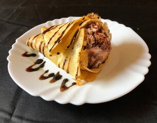 crepe with ice cream in syrup