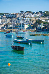 Boats moored in harbour at beautiful British coastal town St Ives, Cornwall, England