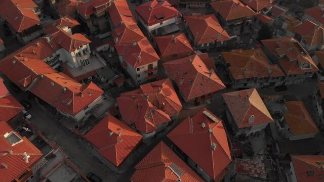 Magnificent Red Rooftops In A Quiet Bulgarian Village In Europe - aerial shot
