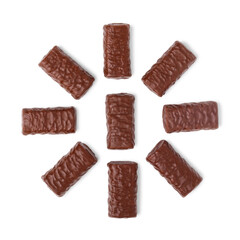 Group of chocolate candies isolated on white background, top view.