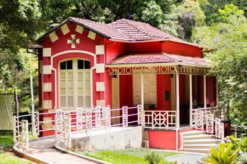 red house in the woods