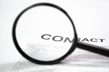  enlarged contract. Magnifier increases the contract. sign contract