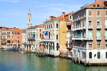 Narrow water canal, Venice cityscape, bridge and traditional buildings. Italy, Europe.