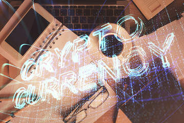 Double exposure of blockchain theme hologram over table with phone. Top view. Crypto technology concept.